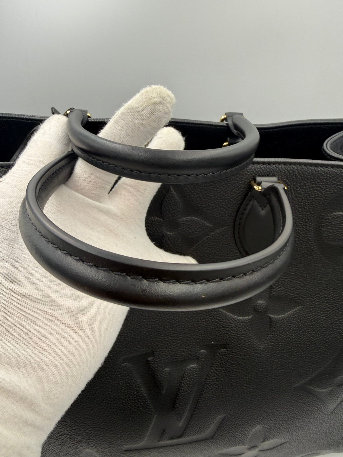 LOUIS VUITTON ON THE GO Empreinte GM Handbag