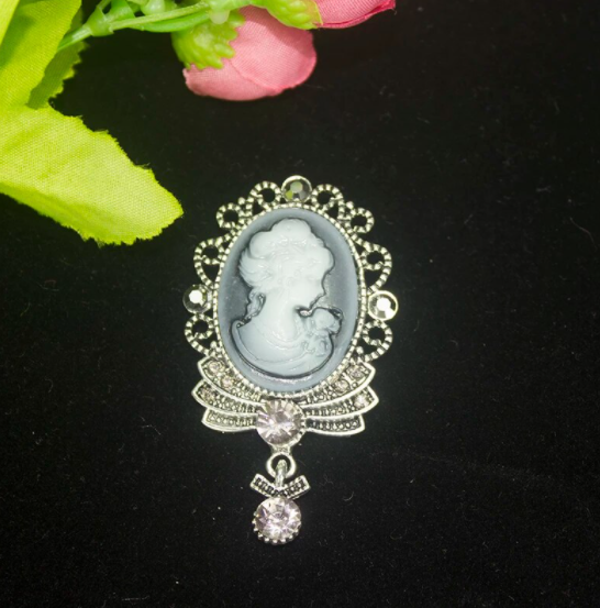 Vintage Gray Queen Head Brooch