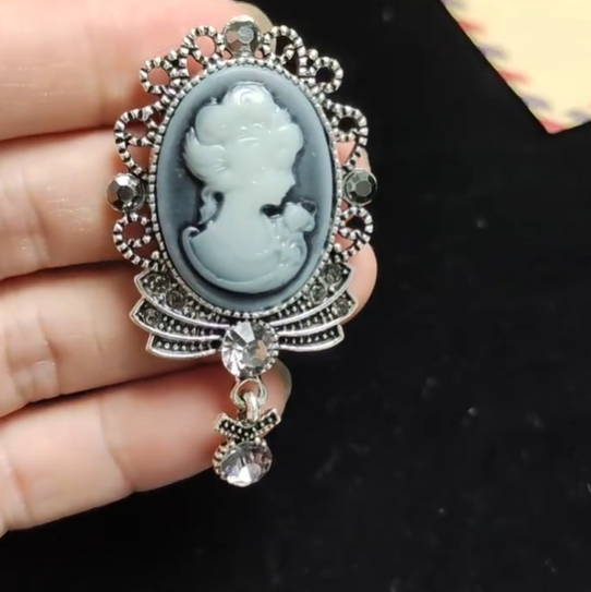 Vintage Gray Queen Head Brooch